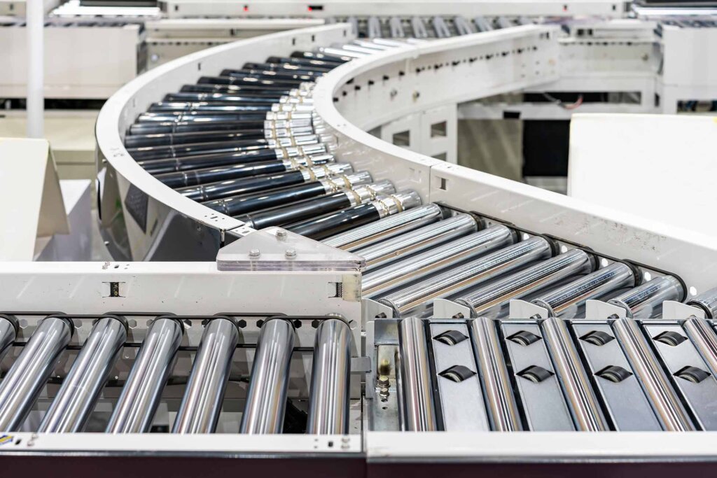 Conveyor Component Manufacturers and Their Role in the Material Handling Industry